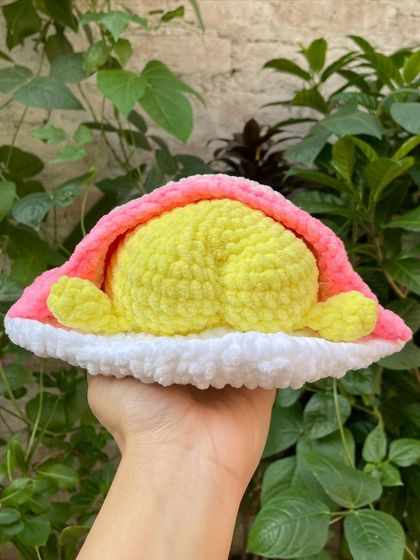 The back view of the Gudetama plushie, showing his famously cute butt. It's these quirky details that make characters so fun to create.