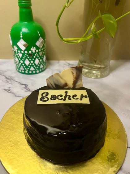 My Sacher Torte, made the traditional way. It's a timeless dessert that balances the richness of chocolate with the subtle sweetness of apricot.