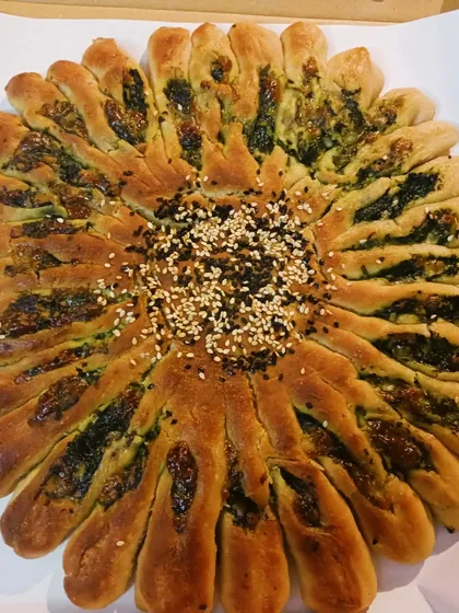 My gluten-free Millet Sunflower Bread, stuffed with spinach and my homemade vegan cheese. It's not just food; it's edible art that is both beautiful and nourishing, perfect as a centrepiece for any gathering.