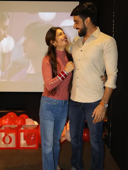 A happy couple celebrating a birthday in front of the big screen. The joy and love between them are what make these moments so special to be a part of.