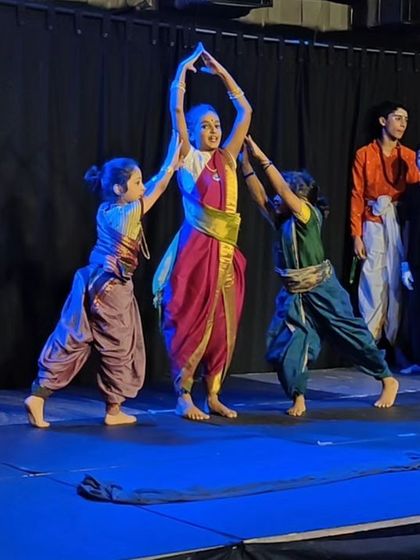 A repeat of the dynamic on-stage collaboration, showing the energy and focus of our young performers. This moment captures the essence of ensemble work that we teach in our children's theatre programs.