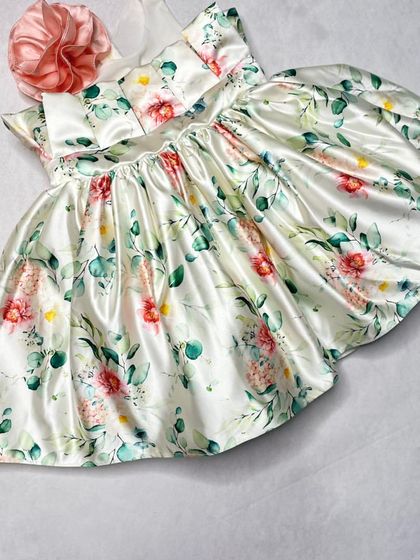 The "Floral Grace" dress in a slightly different style, with a pleated bodice and a simple, elegant silhouette that lets the beautiful floral satin shine.