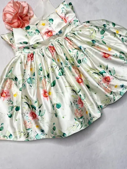 The "Floral Grace" dress in a slightly different style, with a pleated bodice and a simple, elegant silhouette that lets the beautiful floral satin shine.