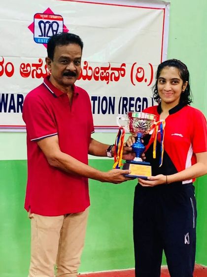 Sahana H Murthy receiving her trophy for being the U17 Girls Runner-up at the State Ranking Tournament.