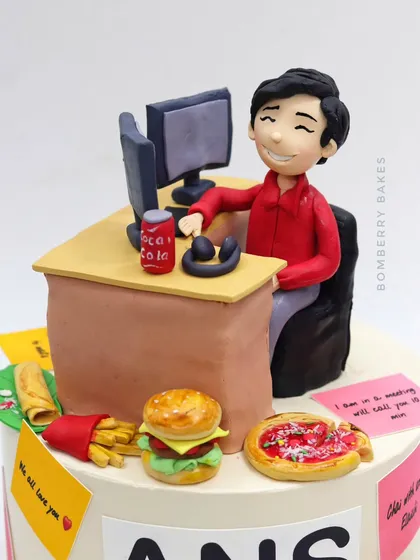 A close-up of the boss figurine at his desk, surrounded by tiny edible versions of pizza, burgers, and fries.