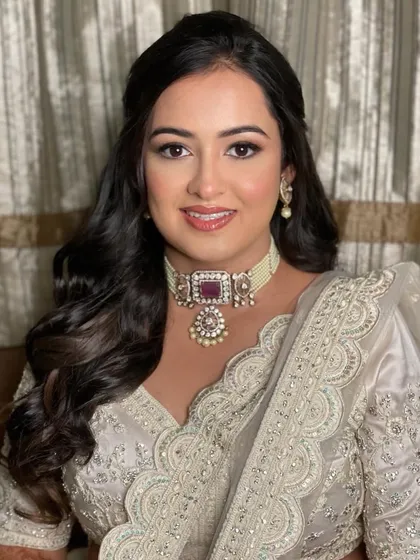 Krusha looking absolutely radiant for her sangeet. The soft glam makeup enhances her features without overpowering her natural beauty.