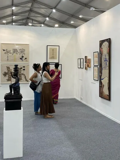 A view of our Art Mumbai booth, showing visitors interacting with various artworks.