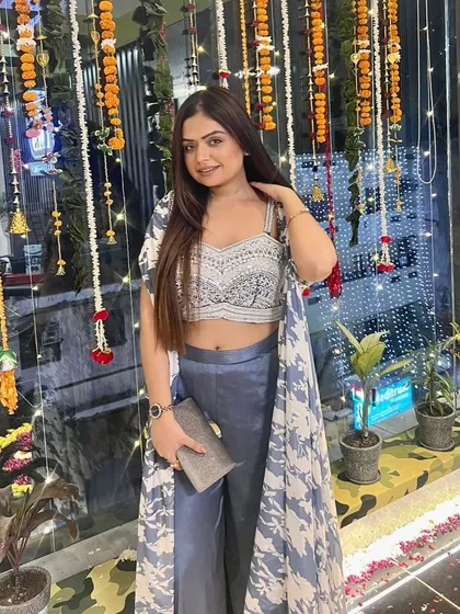 This Indo-western co-ord set is my idea of the perfect modern Diwali outfit. The embellished crop top paired with satin pants and a matching cape is comfortable, stylish, and lets you celebrate without any fuss.