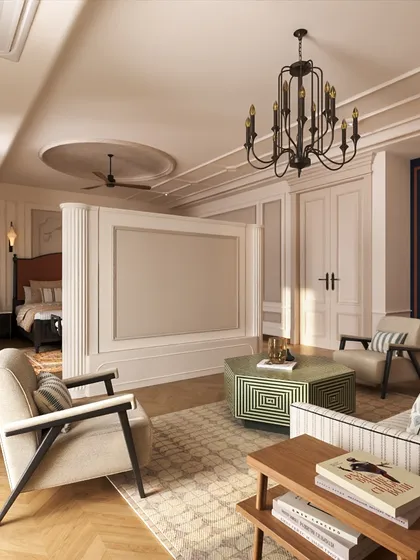 This view shows the bedroom's integrated lounge area, separated by a clever floating TV wall. This design creates two distinct zones for sleeping and relaxing within a single, harmonious space, blending classic elegance with modern functionality.