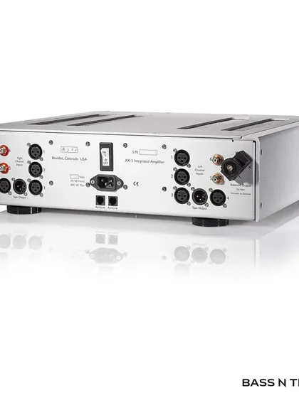 The rear panel of the Ayre AX-5 showcases its comprehensive connectivity options. This fully-balanced design ensures the cleanest signal path from source to speaker, a hallmark of Ayre's commitment to audio excellence.