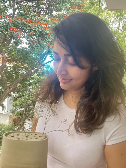 Swathi with one of her beautiful creations, a testament to her journey and hard work.
