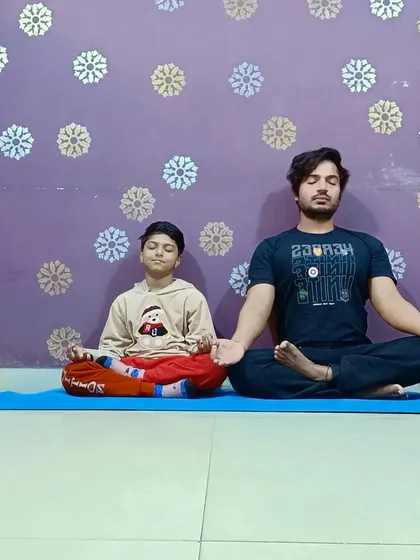 A moment of calm. Practicing meditation and breathing exercises with my student to improve focus and mindfulness.