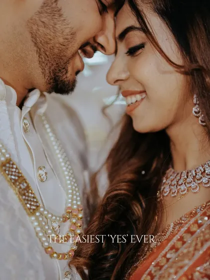 The easiest 'yes' ever. In this quiet, close moment, I see a whole universe of promises and smiles. It’s these gentle, unspoken connections that I love to frame, turning a simple glance into a timeless memory.