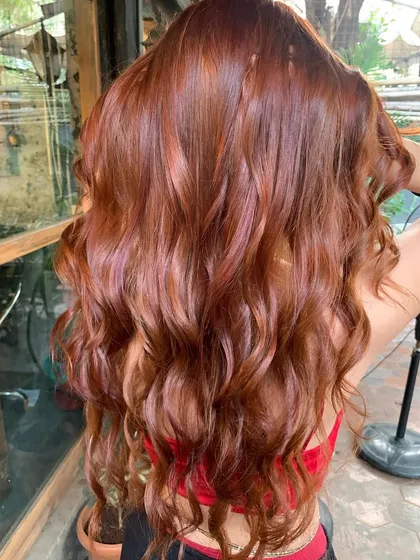 Another view of the 'Cowboy Copper' hair. The color is so rich and vibrant, it's a real head-turner.