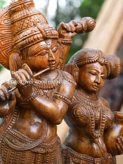 A close-up of the divine couple from the 20-inch Radha Krishna statue, showing their interconnectedness and the harmony of the composition.