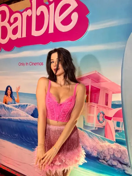 For the Barbie movie premiere, I styled actress Giorgia Andriani in this fun and flirty pink feather-trimmed skirt and corset top. It was the perfect playful look for a themed red carpet event.