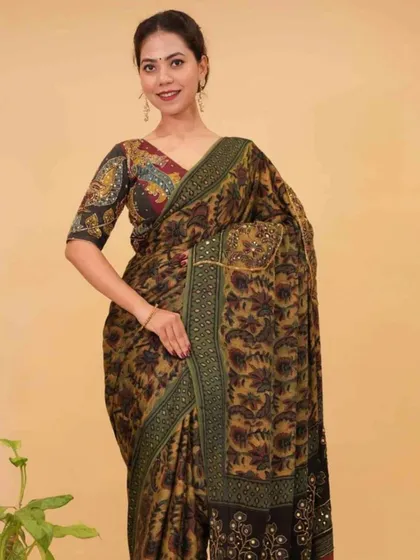 A Kalamkari print 1-minute saree with beautiful border detailing. This pre-stitched saree allows you to wear traditional Indian artistry with modern convenience.