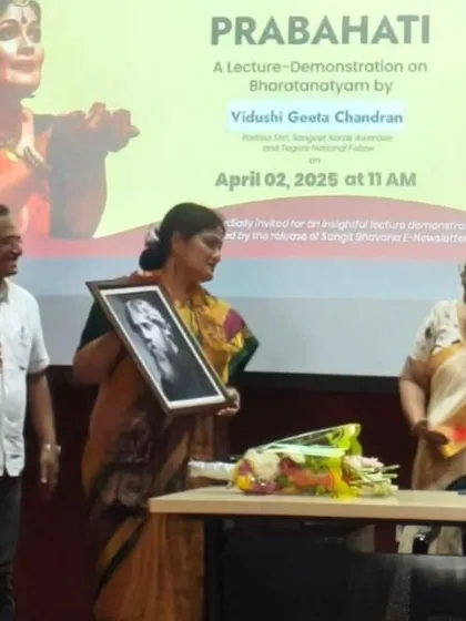 Receiving a portrait of Rabindranath Tagore at the conclusion of my lec-dem at Shantiniketan.