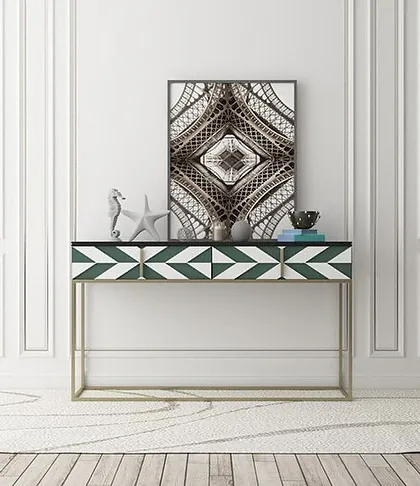Make a statement with this bold geometric console table. The striking green and white chevron pattern on the drawers, paired with a minimalist gold frame, brings a modern edge to any room.