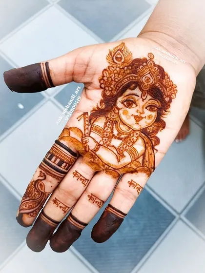 Celebrating festivals with themed mehndi is one of my specialties. This intricate portrait of Bal Krishna was created for Janmashtami, complete with his flute and peacock feather.