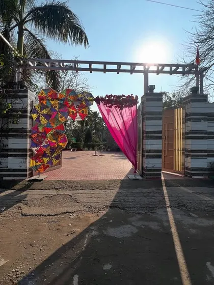 The entrance to Arora Farms, decorated by us for a wedding event with colorful props and drapes.