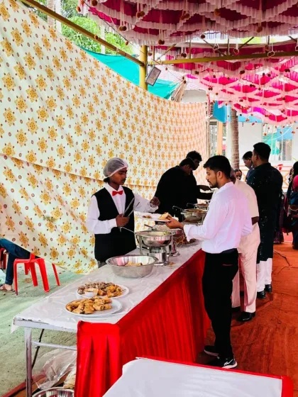 Our professional team is always ready to serve. Here is one of our staff members at the buffet counter during a wedding in Pen, making sure guests are served efficiently.