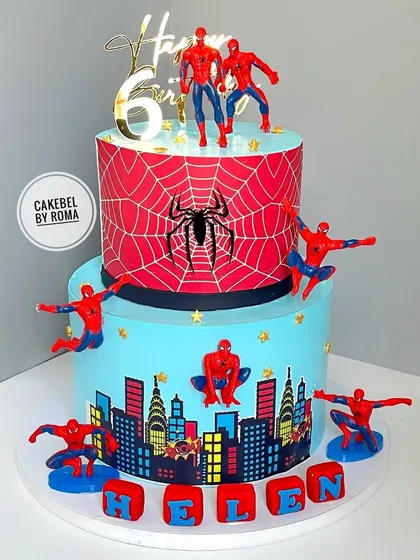 A two-tiered Spider-Man cake for a young superhero's 6th birthday. I had so much fun placing multiple Spideys swinging into action around the city skyline, making it an adventure from every angle.