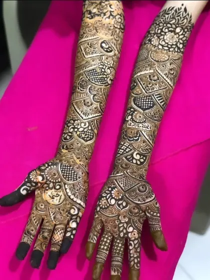A gorgeous bridal mehendi for Fathie, featuring a mix of modern geometric patterns and delicate floral work.