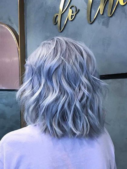 Another angle of the ash-blue hair, showing how the light reflects off the metallic tones to create a stunning, multi-faceted look.