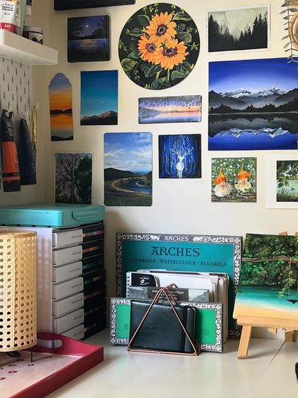 A close up of my art wall, showing a collection of my favorite mini paintings.