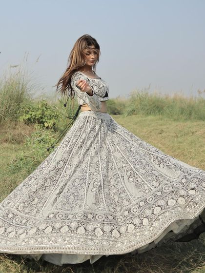 Another beautiful twirl shot, showing the incredible movement and craftsmanship of this lehenga.