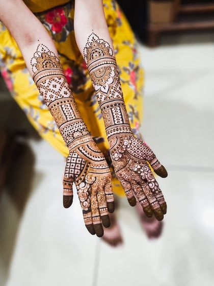 A full view of a bridal design that incorporates both traditional patterns and personalized text.