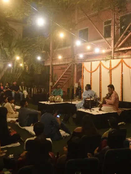 A view of the audience at The Courtyard, completely absorbed in the music under the evening lights. This is the connection I strive for in every performance.