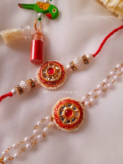 A closer look at one of my traditional Kundan Bhai Bhabhi sets. The intricate mirror work and red stone are set on a classic red thread for him and a delicate pearl chain for her.
