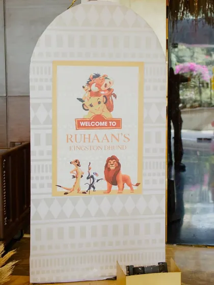 A custom welcome board for "Ruhaan's Kingston." We design all our printed materials to perfectly match the party's theme and color scheme.