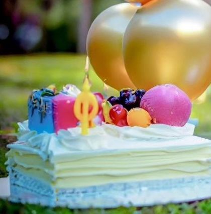 A close-up of a colorful birthday cake, ready for celebration. I capture all the little details that make your child's party special.