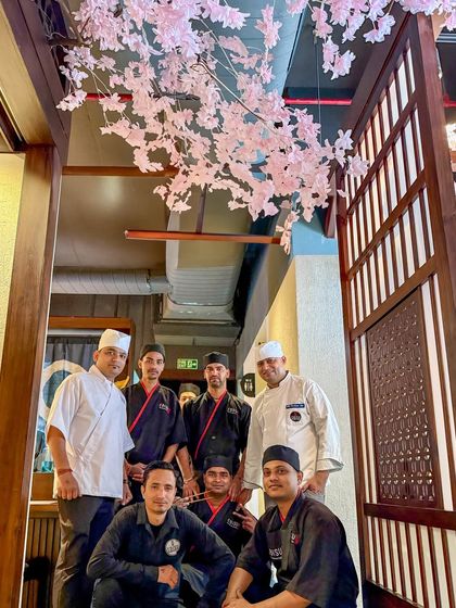 My talented team of chefs and servers, pictured here under the beautiful cherry blossoms we set up for our Sakura season celebration. We were thrilled to share this special time with our guests.