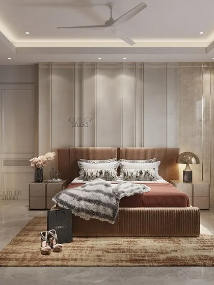 Looking for the perfect blend of minimalism and warmth? This bedroom features a beautiful paneled wall, a cozy rust-colored bed, and a dedicated vanity area, all in a soothing, neutral palette.