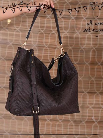 The Namrata hobo bag, fully crafted in our All Woven Oak leather. The hand-weaving process gives this large, soft bag a beautiful texture and structure while keeping it lightweight and comfortable for everyday use.