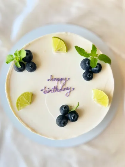 My most popular creation, the signature Italian Lemon & Blueberry cake. I offer many design variations, all featuring fresh blueberries, zesty lime, and smooth buttercream.