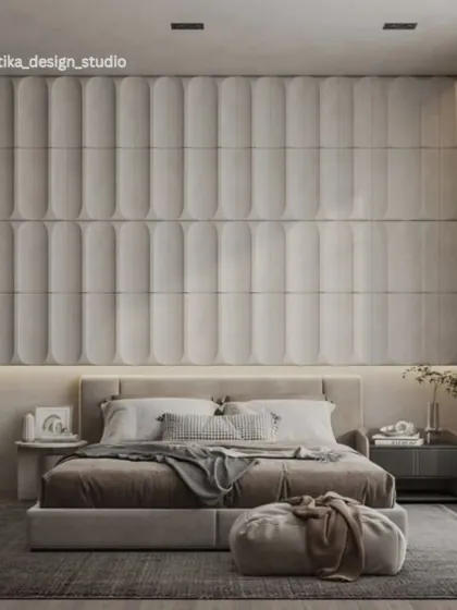 I believe a bedroom should be a luxurious retreat. Here, the floor-to-ceiling upholstered wall paneling creates a dramatic yet soft focal point. The layered neutral tones, plush fabrics, and ambient lighting come together to form a serene and sophisticated space designed for ultimate relaxation.