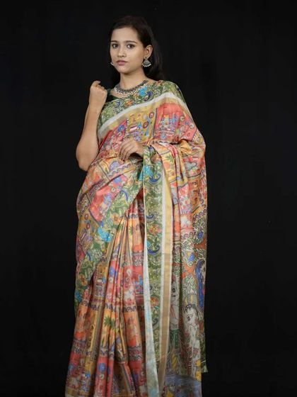 A vibrant, multi-colored Kalamkari print on a pre-stitched saree. This piece is a true work of art, made easy to wear for those who appreciate traditional crafts but need a convenient solution.