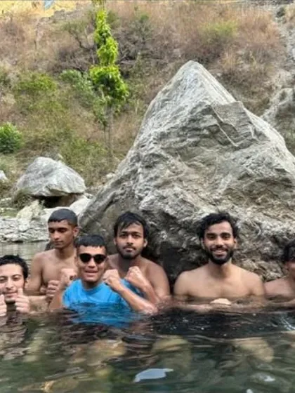 Cooling down in the river after a tough training session. Our camps are a perfect balance of hard work and rejuvenation.