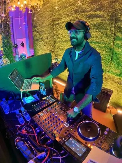 In my element, ready to perform alongside a percussionist and saxophonist. This trio setup against a vibrant green backdrop looks as good as it sounds.