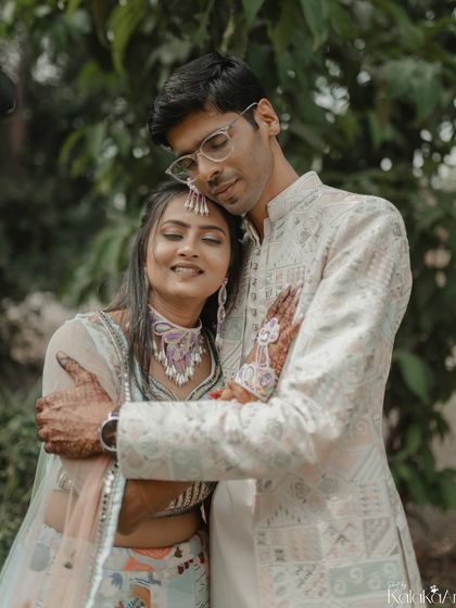 A comforting and intimate embrace, capturing a quiet moment of togetherness away from the crowds.