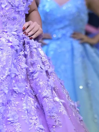 A beautiful shot capturing the texture and color palette of my GULFAM collection, with the lavender and blue gowns side-by-side.