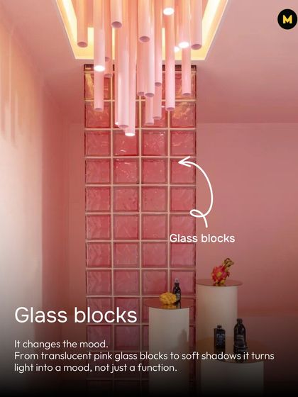 Pink can change the mood. These translucent pink glass blocks turn light into a mood, not just a function, casting soft shadows and adding a unique architectural element.