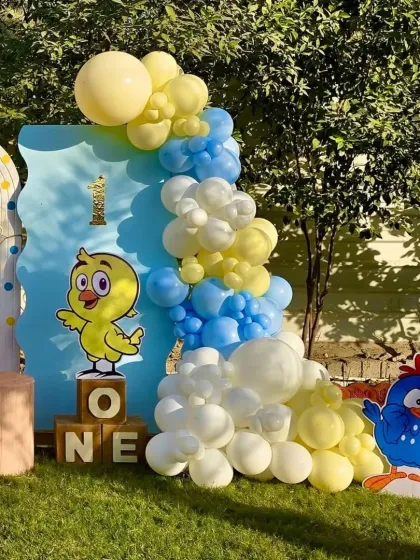 A complete view of the right side of the duckling setup, featuring the 'ONE' blocks and character props.