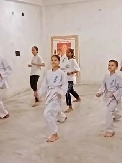 Students practicing their forward movement in stance. Footwork is just as important as hand techniques.
