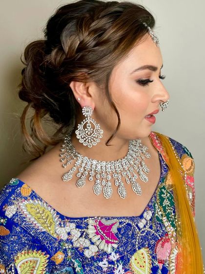 A view of the intricate braided updo, which adds a touch of modern elegance to the traditional look.